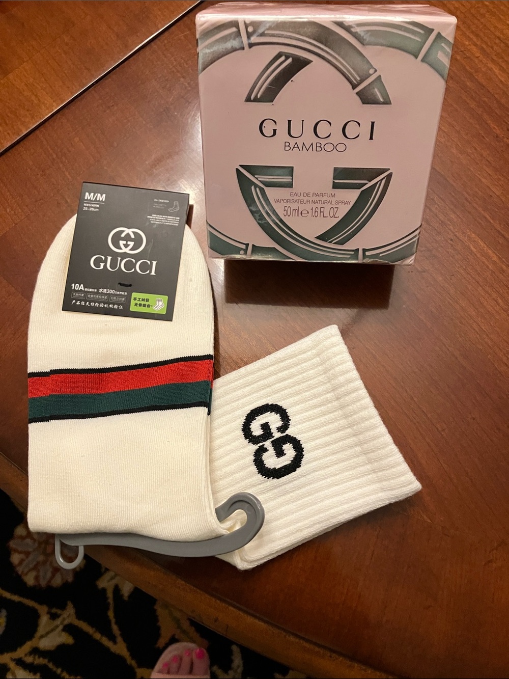 GUCCI. Women’s Perfume & Men’s Socks. A gift for each of you!!! Both are NWT!!!